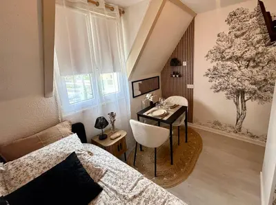 Coin salon dans l'établissement Le Ptit Jumoku