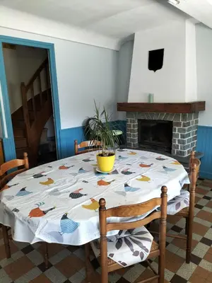 Coin salon dans l'établissement Charmante maison dans le bocage proche A84