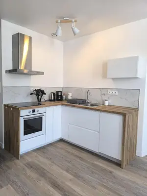 Cuisine ou kitchenette dans l'établissement appartement proche de la Baie du Mont saint Michel