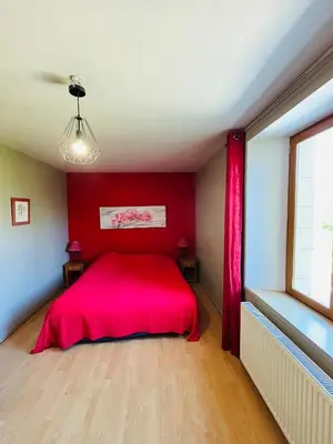 Un ou plusieurs lits dans un hébergement de l'établissement Chambre d'hôtes tout confort
