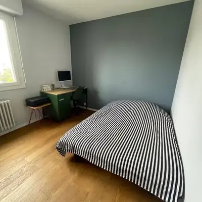 Chambre privée chez l'habitant avec accès à des espaces partagés
