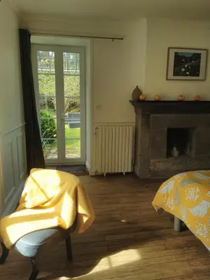 Coin salon dans l'établissement Chambre d'hôtes Côté Jardin