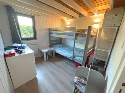 Un ou plusieurs lits dans un hébergement de l'établissement Chalet moderne 6 pers avec piscine l'été