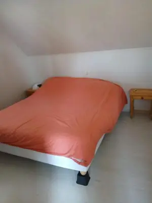 Un ou plusieurs lits dans un hébergement de l'établissement Chalet 5 personnes proche de la mer à Merville-Franceville-Plage