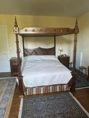 Un ou plusieurs lits dans un hébergement de l'établissement Château de la cour de Coulonces