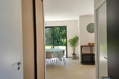 Un ou plusieurs lits dans un hébergement de l'établissement Charmante maison neuve
