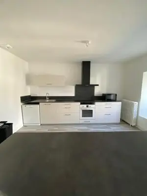 Cuisine ou kitchenette dans l'établissement Appartement chaleureux et accueillant à quelques pas de la mer