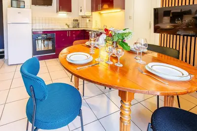 Cuisine ou kitchenette dans l'établissement Apartment Douillet