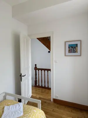 Un ou plusieurs lits dans un hébergement de l'établissement Maison de ville - 3 chambres
