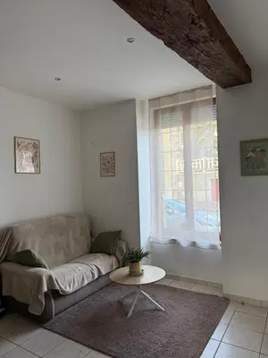 Coin salon dans l'établissement Maison de ville - 3 chambres