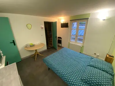 Un ou plusieurs lits dans un hébergement de l'établissement Studio cosy à Cherbourg-en-Cotentin - 15 m²