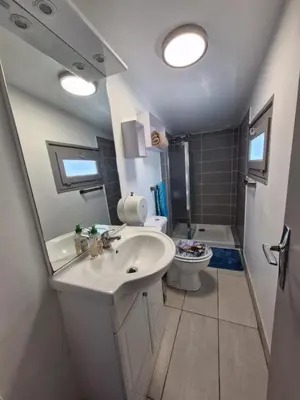 Salle de bains dans l'établissement Les Bleuets