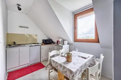 Cuisine ou kitchenette dans l'établissement Le Nid Marin - A 400m de la plage