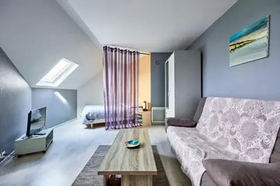 Coin salon dans l'établissement Le Nid Marin - A 400m de la plage