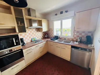 Cuisine ou kitchenette dans l'établissement Le haie vigné