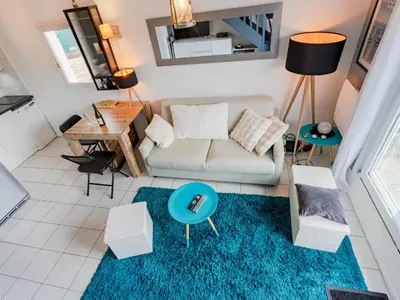 Coin salon dans l'établissement Apartment Les christophines-5 by Interhome