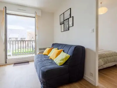 Coin salon dans l'établissement Apartment Cabourg Plage-24 by Interhome