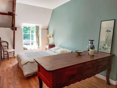 Un ou plusieurs lits dans un hébergement de l'établissement Holiday Home La Grulais by Interhome