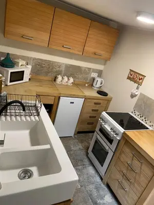Cuisine ou kitchenette dans l'établissement La Petite Maison, Perrou, Normandy, Orne