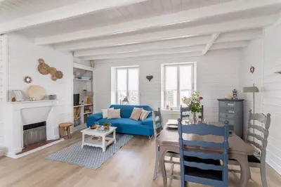 Coin salon dans l'établissement Désirée - Appartement en duplex à quelques pas du port