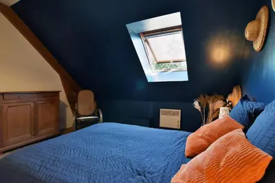 Un ou plusieurs lits dans un hébergement de l'établissement Maison du Bonheur - Parking - Wifi