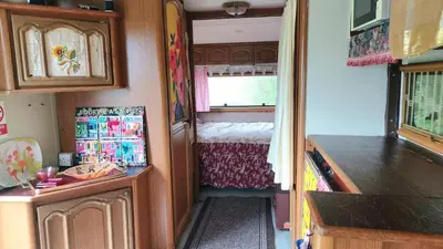 Un ou plusieurs lits dans un hébergement de l'établissement Countryside Caravan