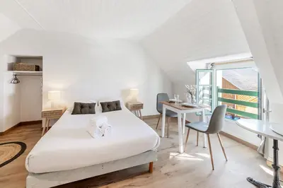 Un ou plusieurs lits dans un hébergement de l'établissement Bord de l'eau 5 - Studio - Sea view