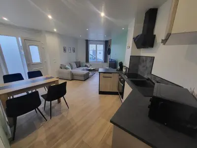 Télévision ou salle de divertissement dans l'établissement Appartement rez-de-chaussée
