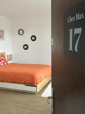 Un ou plusieurs lits dans un hébergement de l'établissement Chez Max