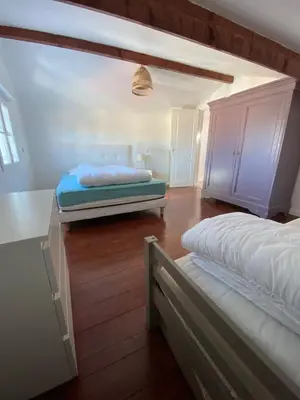 Un ou plusieurs lits dans un hébergement de l'établissement BEAU DUPLEX 80 m2 100 metre de la plage
