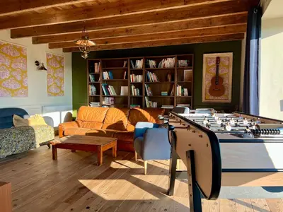 Coin salon dans l'établissement L'hôtel Callot - Longère à la campagne