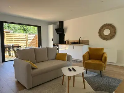 Coin salon dans l'établissement La Drôme - Gîtes du Bessin