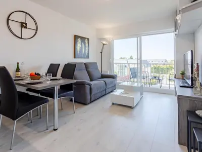 Coin salon dans l'établissement Apartment Le Trimaran-4 by Interhome