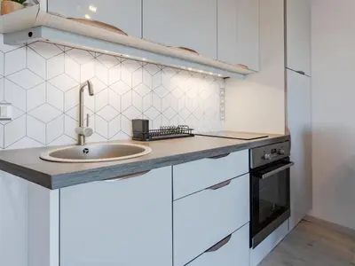 Cuisine ou kitchenette dans l'établissement Apartment Le Trimaran-4 by Interhome