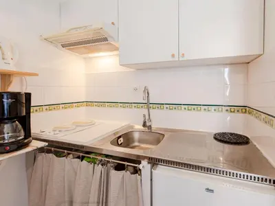 Cuisine ou kitchenette dans l'établissement Apartment Le Sporting-18 by Interhome