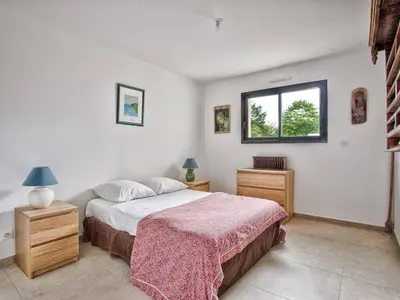 Un ou plusieurs lits dans un hébergement de l'établissement Maison Moderne et Spacieuse à 50m de la Plage pour 12 personnes - FR-1-788-86