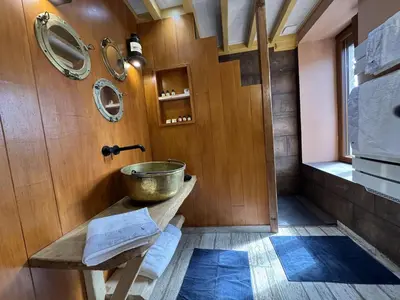 Salle de bains dans l'établissement Riva Bella Marine