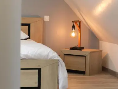 Un ou plusieurs lits dans un hébergement de l'établissement Gîte Confortable pour 2 avec Terrasse et WIFI en Normandie - FR-1-497-253