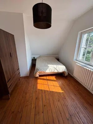 Un ou plusieurs lits dans un hébergement de l'établissement Villa Waterfront View Chausey