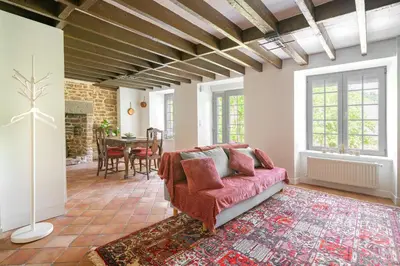 Coin salon dans l'établissement La Maison de Montsecret - Maison paisible pour 6p