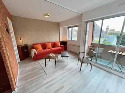 Coin salon dans l'établissement Le Vintage Marin - Studio à 2 minutes à pied de la Plage et du Casino