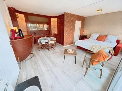 Un ou plusieurs lits dans un hébergement de l'établissement Le Vintage Marin - Studio à 2 minutes à pied de la Plage et du Casino