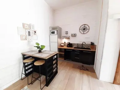 Cuisine ou kitchenette dans l'établissement Le lodge - appartement 4 personnes proche mer