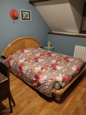 Un ou plusieurs lits dans un hébergement de l'établissement Hébergement dans une grande maison à la campagne