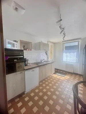 Cuisine ou kitchenette dans l'établissement L'islot d'Eliss