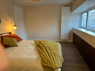 Un ou plusieurs lits dans un hébergement de l'établissement Cozy Loft tout équipé au cœur de Saint-Lô