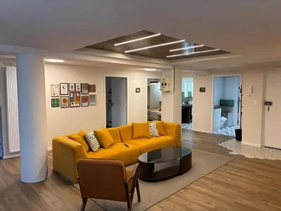 Coin salon dans l'établissement Cozy Loft tout équipé au cœur de Saint-Lô