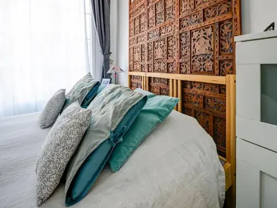 Un ou plusieurs lits dans un hébergement de l'établissement Romantic Stay, Isigny-sur-Mer