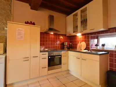 Cuisine ou kitchenette dans l'établissement Seaside Stay in Saint-Clément