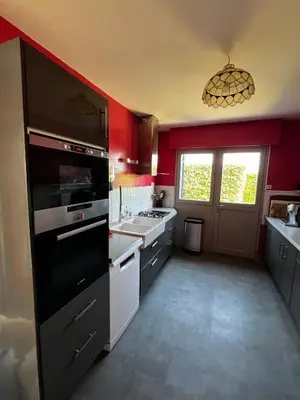 Cuisine ou kitchenette dans l'établissement Villa des Perelles